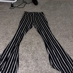 They are flared leggings, with stripes on them. Very soft, only wore 2 times.